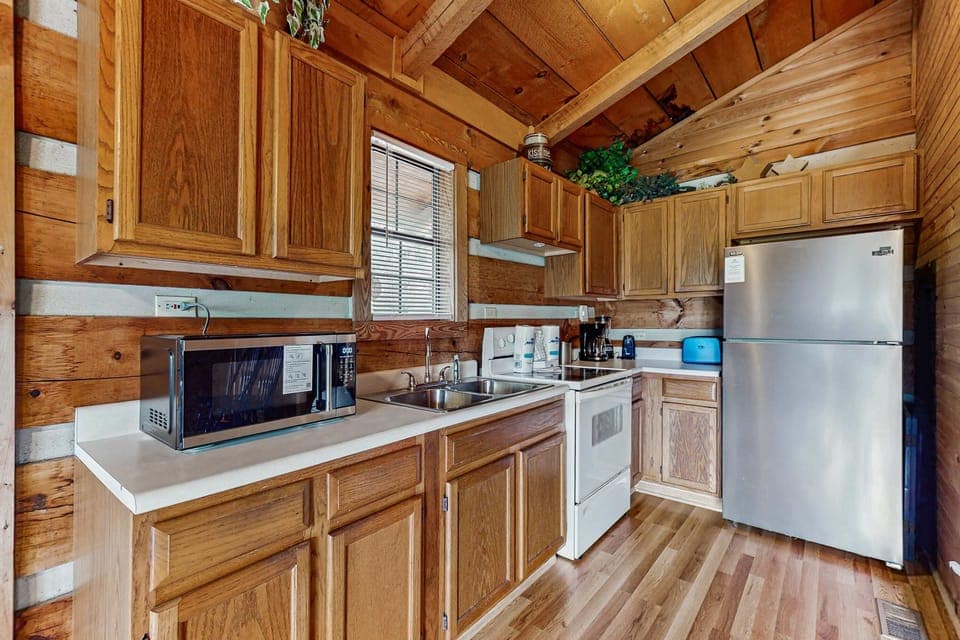 Rustic charm with modern appliances—cook up memories in this inviting space!