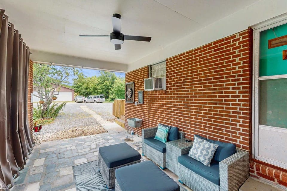 Enjoy sunny days on this inviting porch with stylish seating and great views!