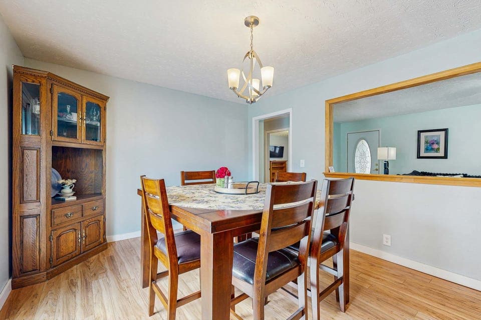 Gather around the stylish table for memorable meals and laughter-filled evenings!Cook up a storm in this bright, airy kitchen with modern appliances and cheerful decor!