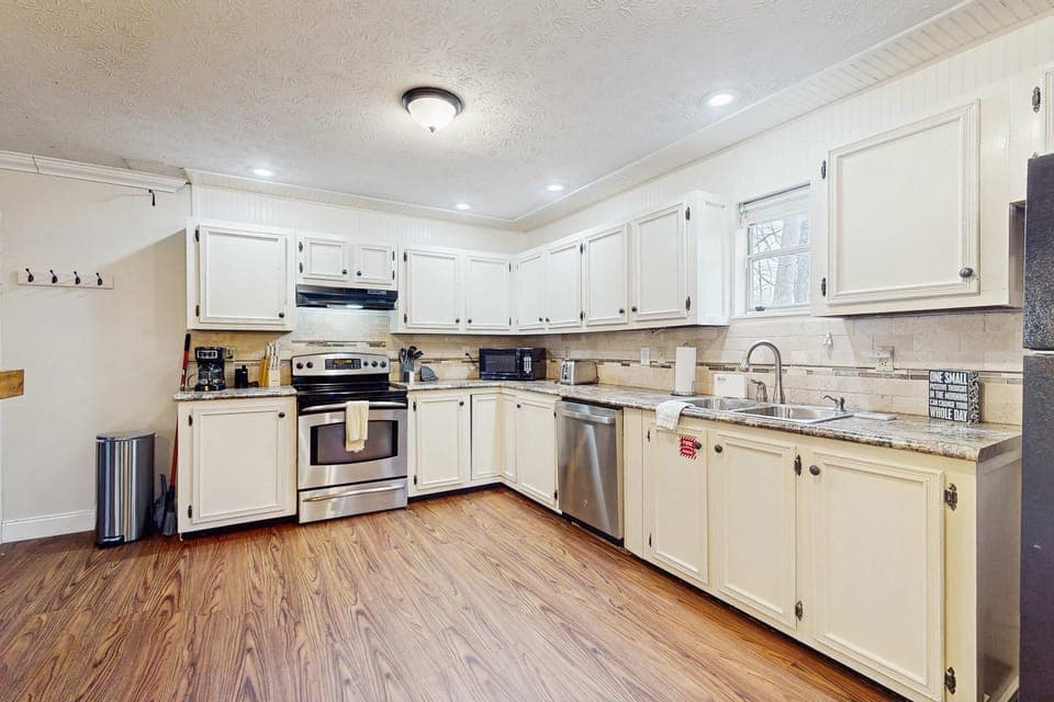 Modern appliances and spacious countertops invite culinary adventures in this charming haven!