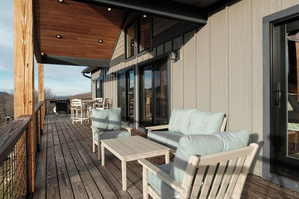 Enjoy fresh mountain air on the expansive deck with plenty of seating for morning coffee, outdoor meals, or wine at sunset. A peaceful gathering space surrounded by High Country scenery.