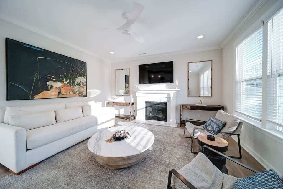 Bright, open living space with natural light, Smart TV, and free Wi-Fi just minutes from Uptown Charlotte.