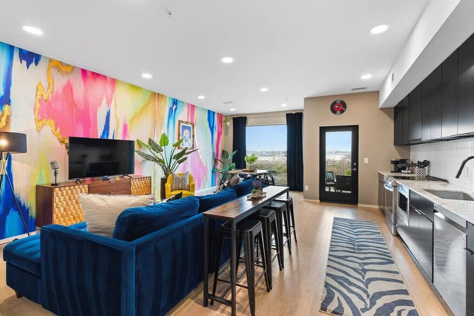 Bright and Spacious living with a sofa bed. HD TV with all the apps you could want. The living room overlooks the Cumberland River with a private patio!