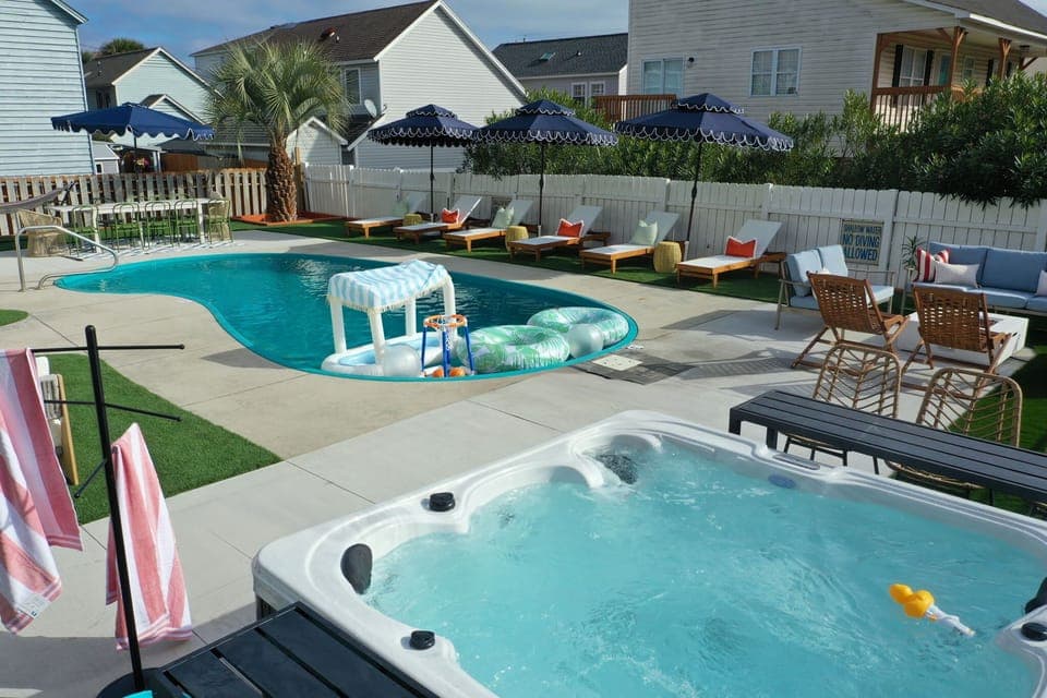 Soak into pure relaxation as the heated pool sparkles beside a bubbling hot tub—your private retreat for sun-soaked afternoons, twilight conversations, and unforgettable memories under Myrtle Beach skies.