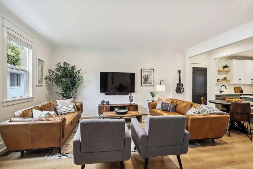 Living Room | Open Concept Seating Area with TV | First Floor | Unit B
