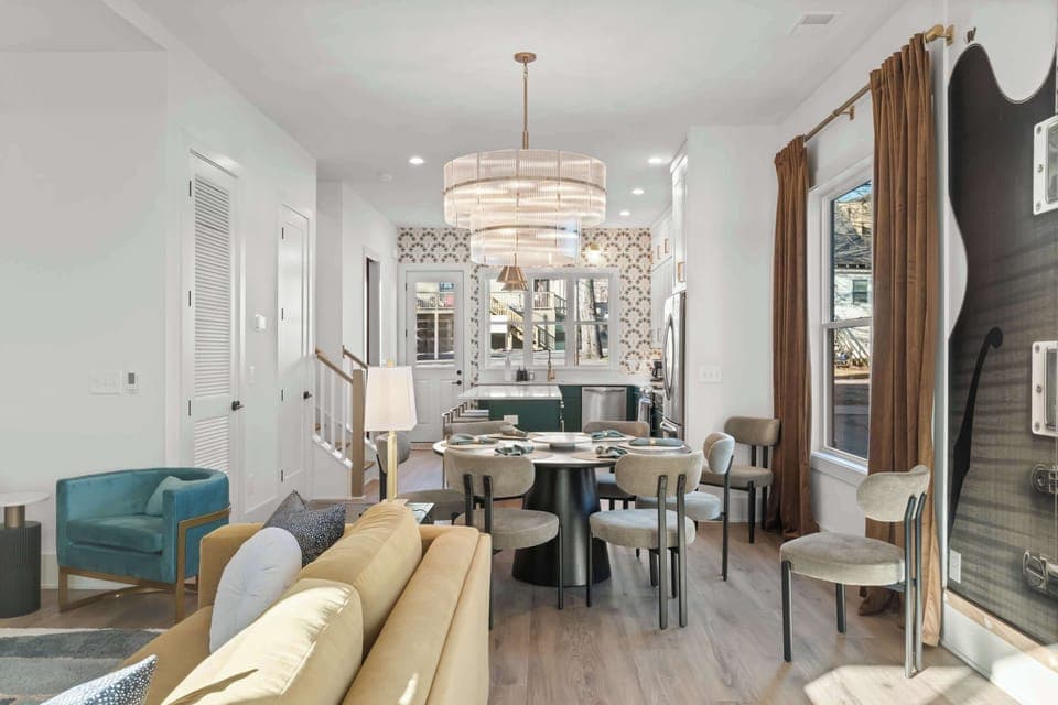 Inviting seating area with accent chairs and coffee table—ideal for conversation, morning coffee, or winding down in the evening.