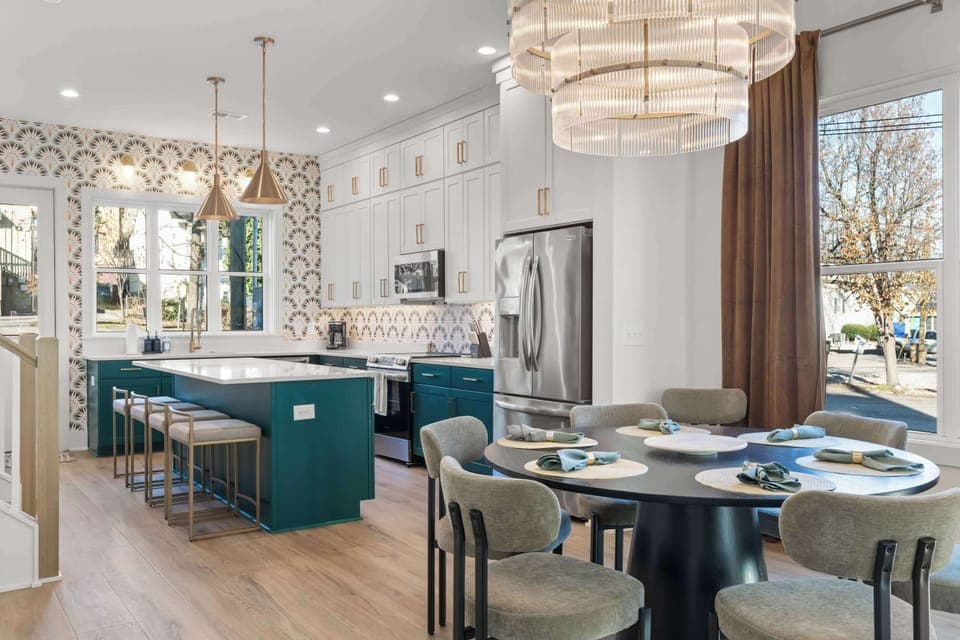 Thoughtfully designed main level with a spacious dining area and elegant chandelier, perfect for shared meals and celebrations.