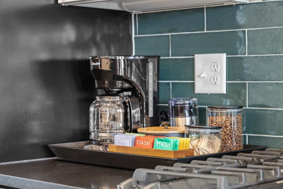 Coffee and Tea Station with first round of beans, creamers, tea bags