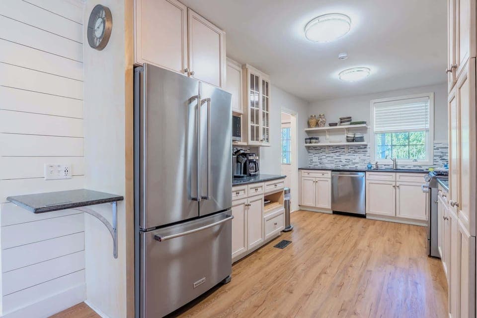 Updated kitchen with modern appliances. Functional space for cooking and entertaining.