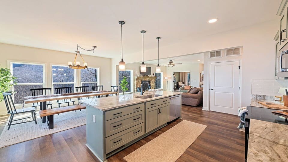 Fully stocked kitchen overlooking the dining and living area. 