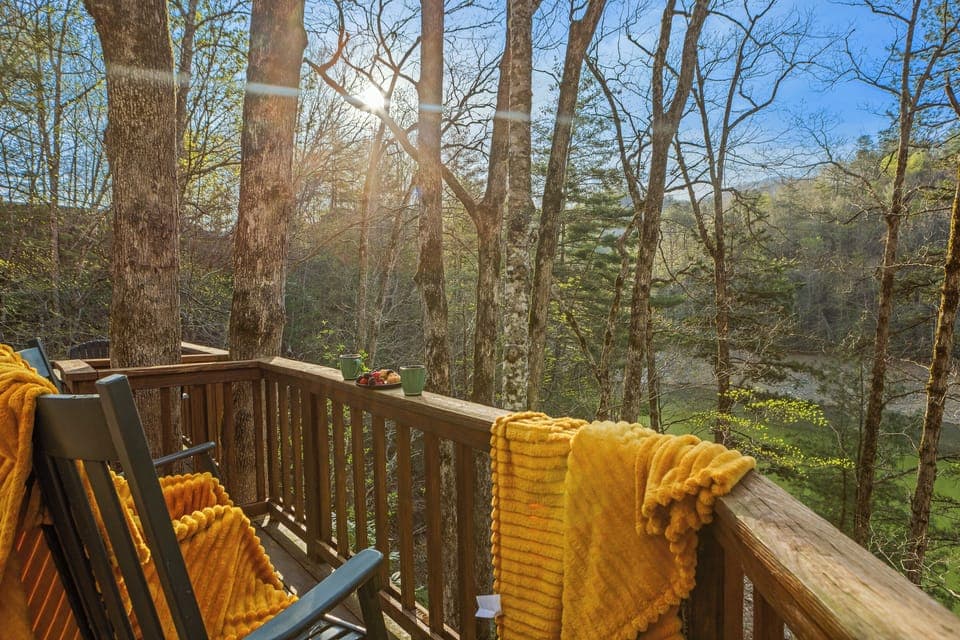 Deck: Sip morning coffee amidst nature's grandeur with stunning views and tranquility!