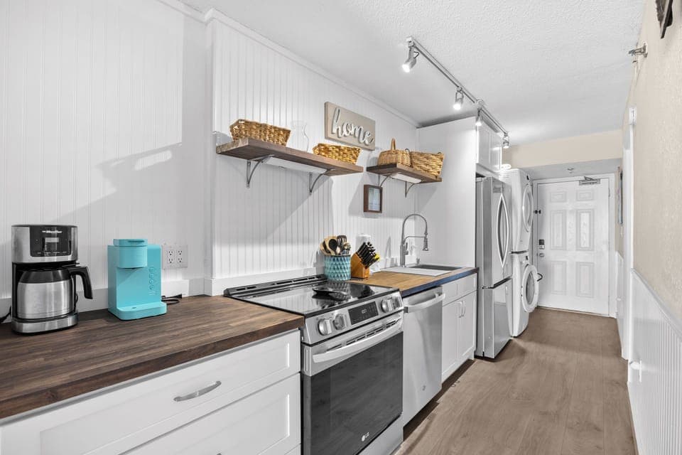 Kitchen Area stocked with all the cooking utensils you should need