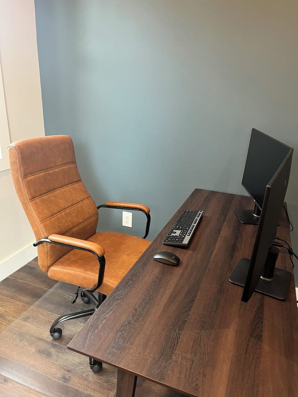 Third bedroom features a USB-C docking station for seamless remote work setup.