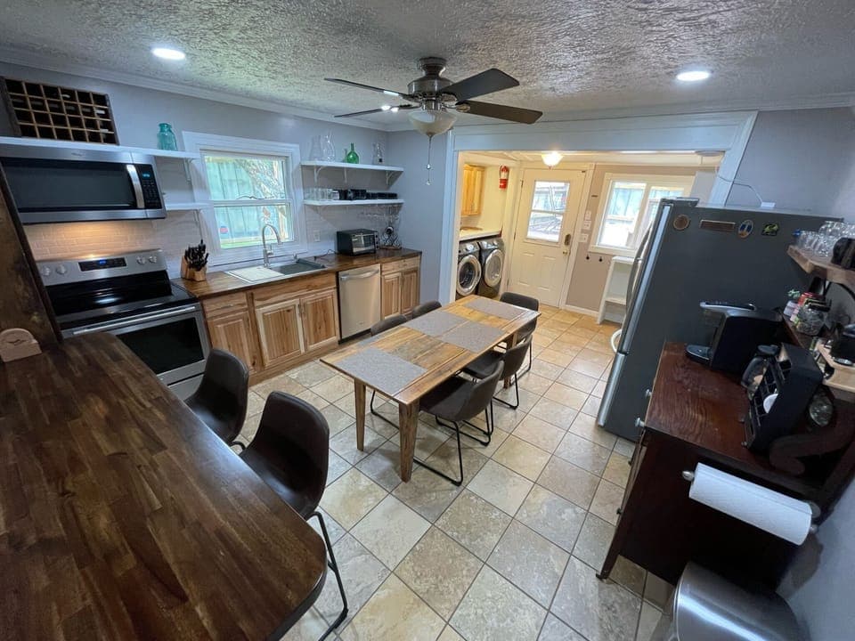 Fully equipped kitchen with dining and laundry in Brevard NC home