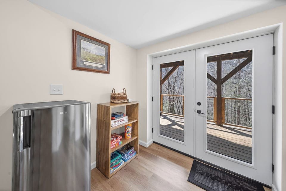 Mini Fridge, Games, and Lower Level Deck Access in the Family Room