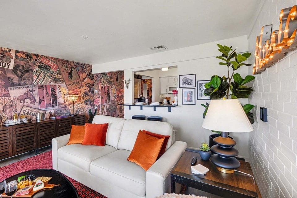 Open living area with Cozy furnishings, a smart TV, and access to the private patio overlooking the Cumberland River.