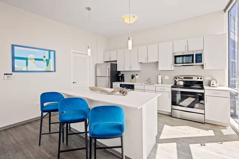 Cook with ease in a bright kitchen with spacious island seating.