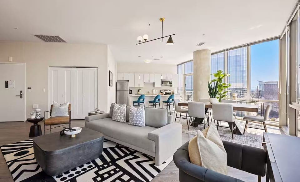 Gather in the airy lounge with skyline views and designer seating.