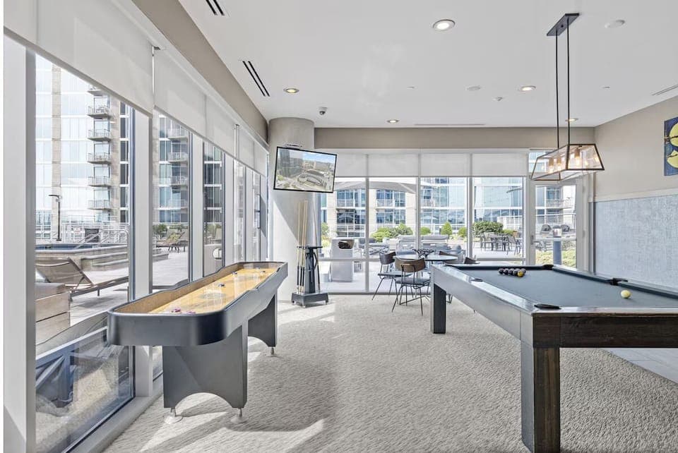 Challenge friends to shuffleboard in this light-filled lounge.