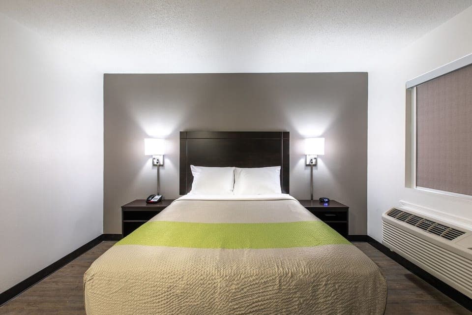 Premium bedding, pillowtop beds, desk, laptop workspace