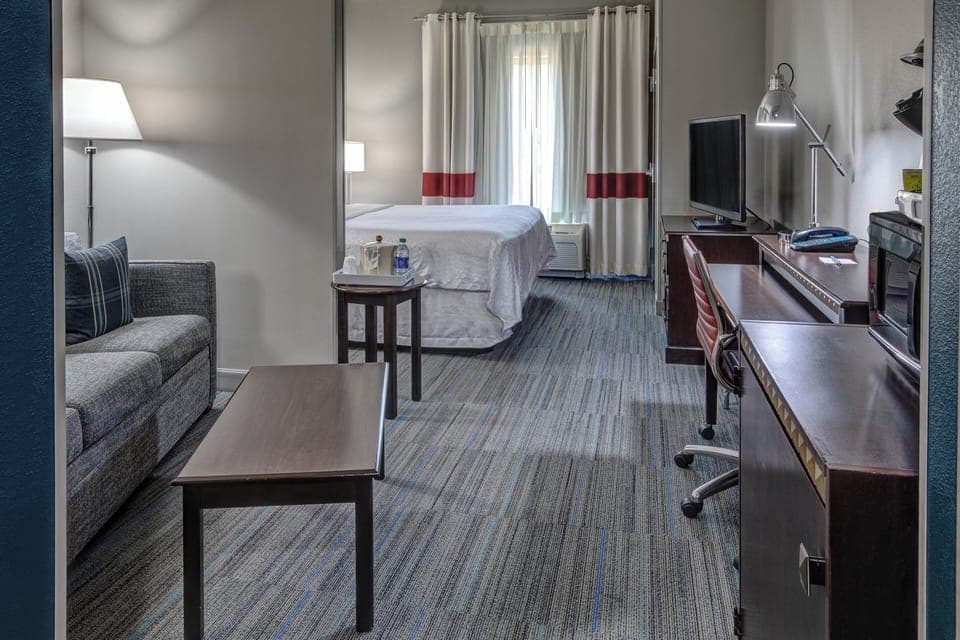 Suite, 1 King Bed with Sofa bed | In-room safe, desk, iron/ironing board, free WiFi