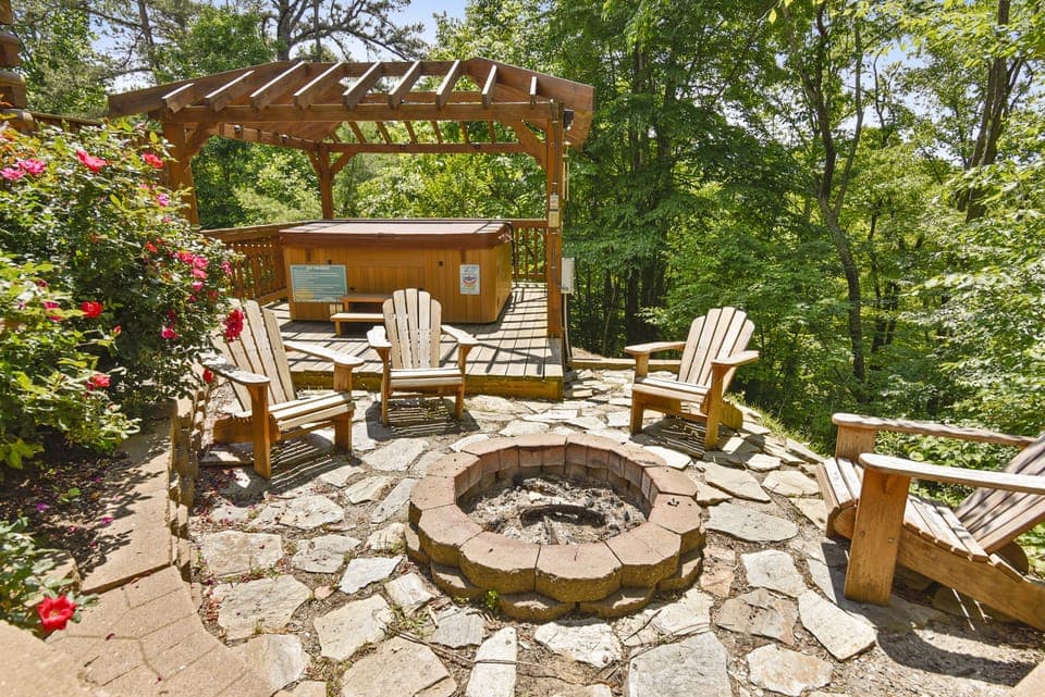 Enjoy outdoor fire pit & therapeutic hot tub.