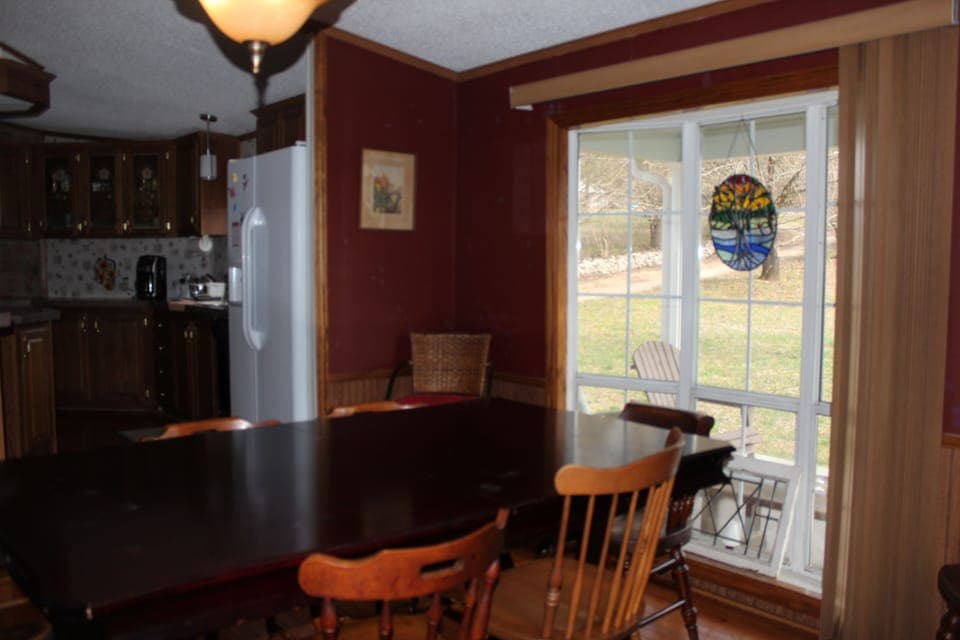 Dining with front porch/yard views.  Watch the birds