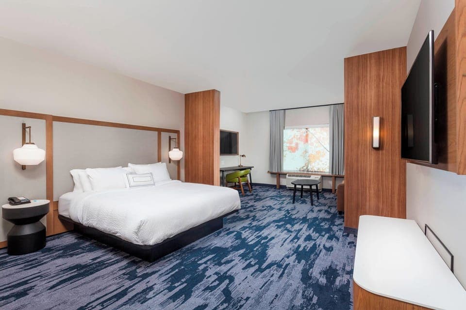 Premium bedding, individually furnished, desk, laptop workspace