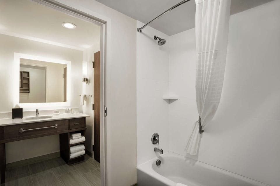 Designer toiletries, hair dryer, towels, soap