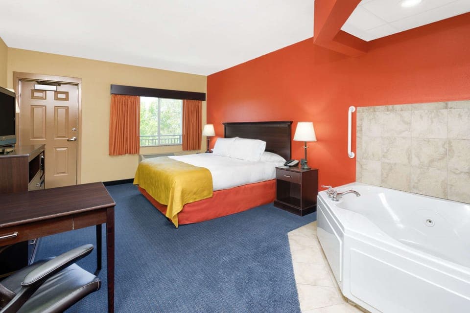 Blackout drapes, soundproofing, iron/ironing board, rollaway beds