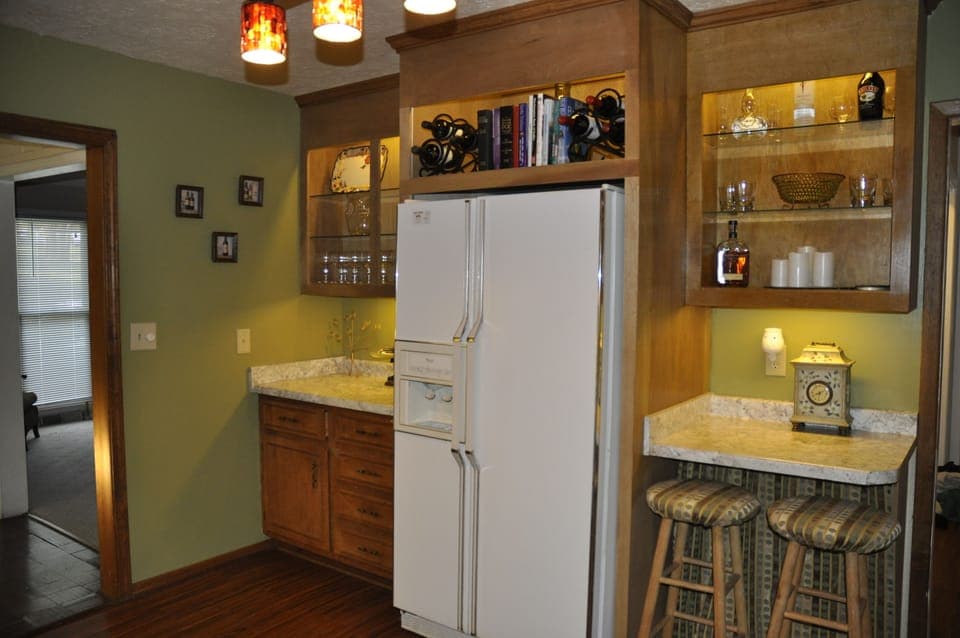 Refrigerator with freezer and ice maker