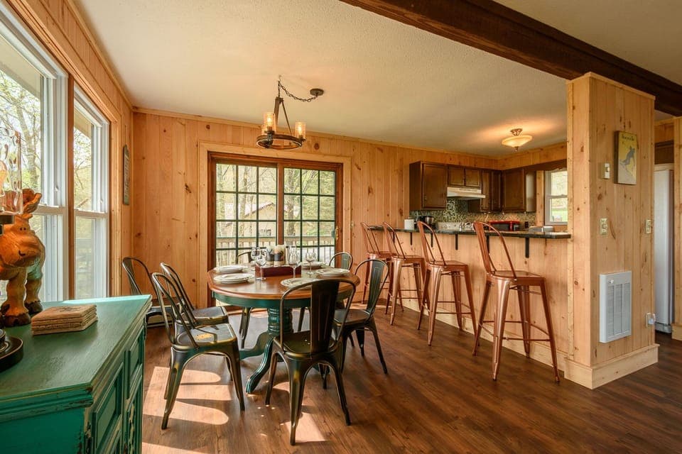 Bar Seating adds Four Dining Spots between Kitchen and Dining Area