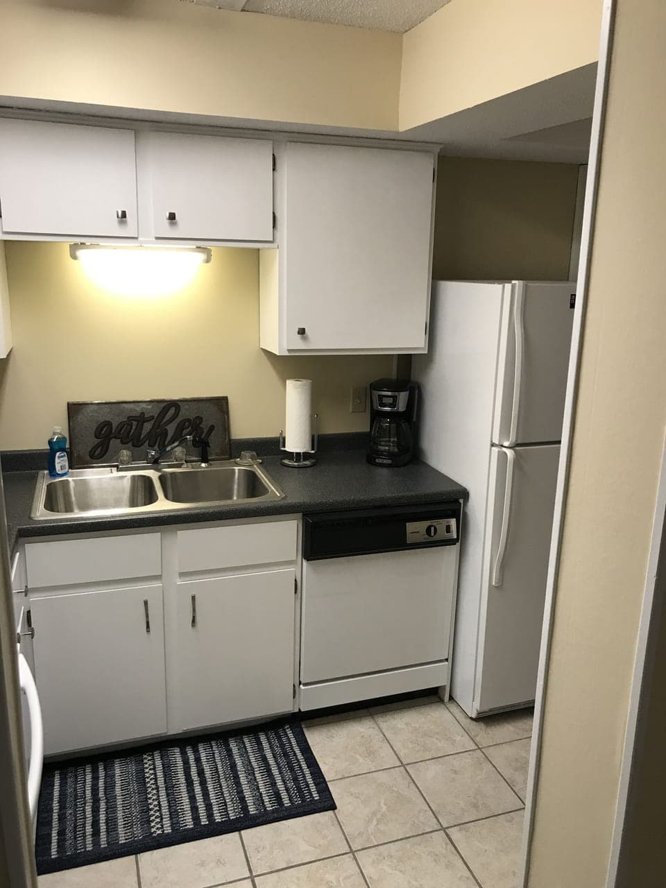Walk thru kitchen into dining room/living room area; standard size appliances