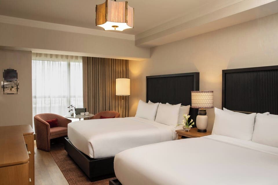 Premium bedding, down comforters, minibar, in-room safe
