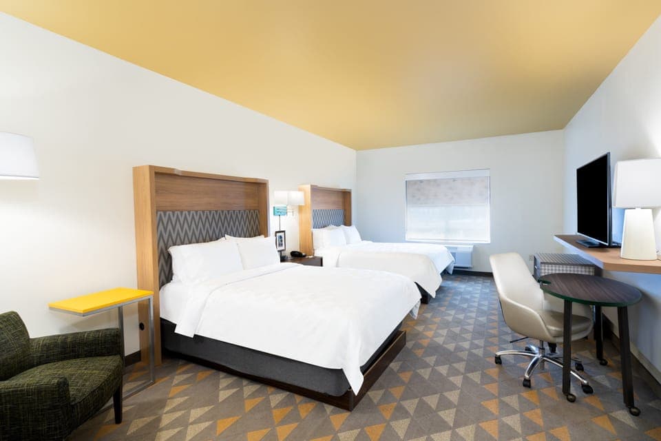 Premium bedding, pillowtop beds, desk, blackout drapes