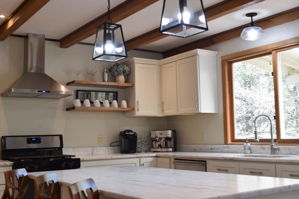 Love the wooden floating shelves!
