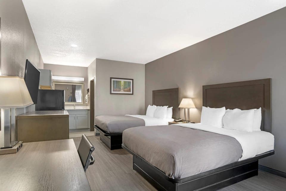 Room, 2 Queen Beds, Non Smoking (Upgrade) | Desk, laptop workspace, iron/ironing board, free WiFi