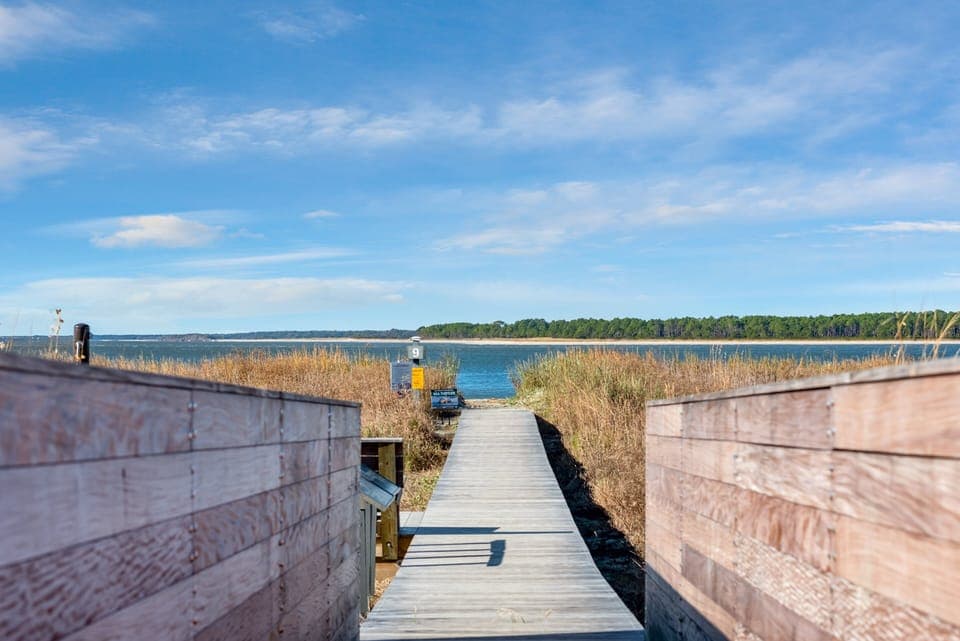 Boardwalk 9 opens to the area where the river meets the ocean.