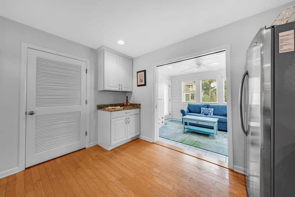 The sunporch is off the kitchen.