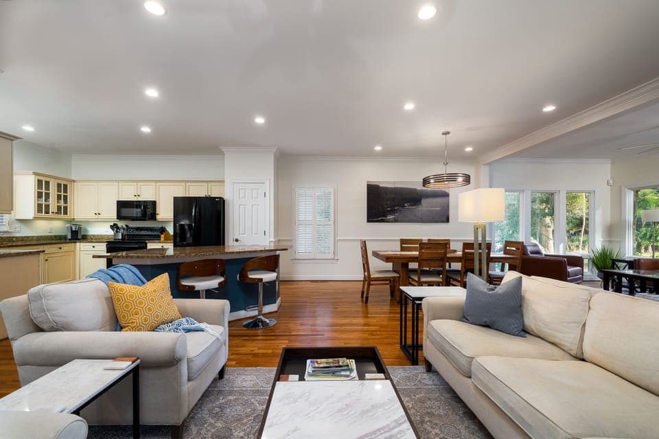 The main living spaces all open to each other letting the whole family be together whether cooking, dining, or relaxing