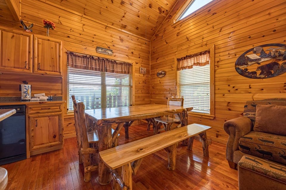 Beautiful log dining table with 2 extra seats at the kitchen bar