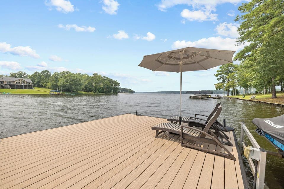 Maintenance free dock. No wood splinters. 8-9ft water depth at end of dock.