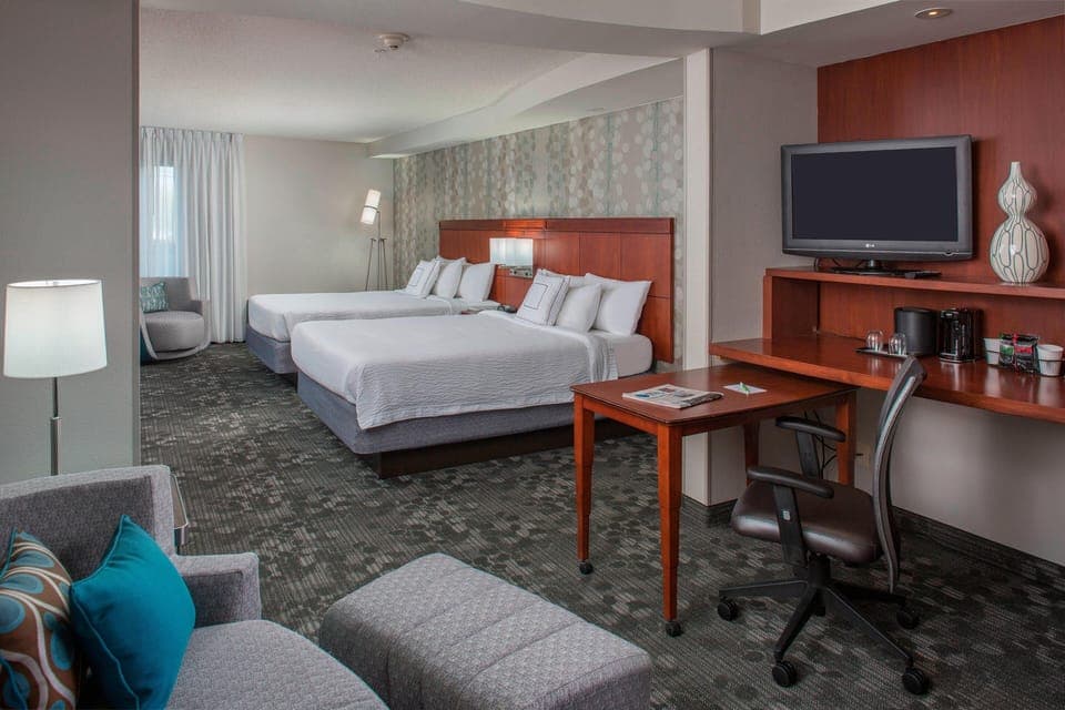 Pillowtop beds, desk, laptop workspace, blackout drapes