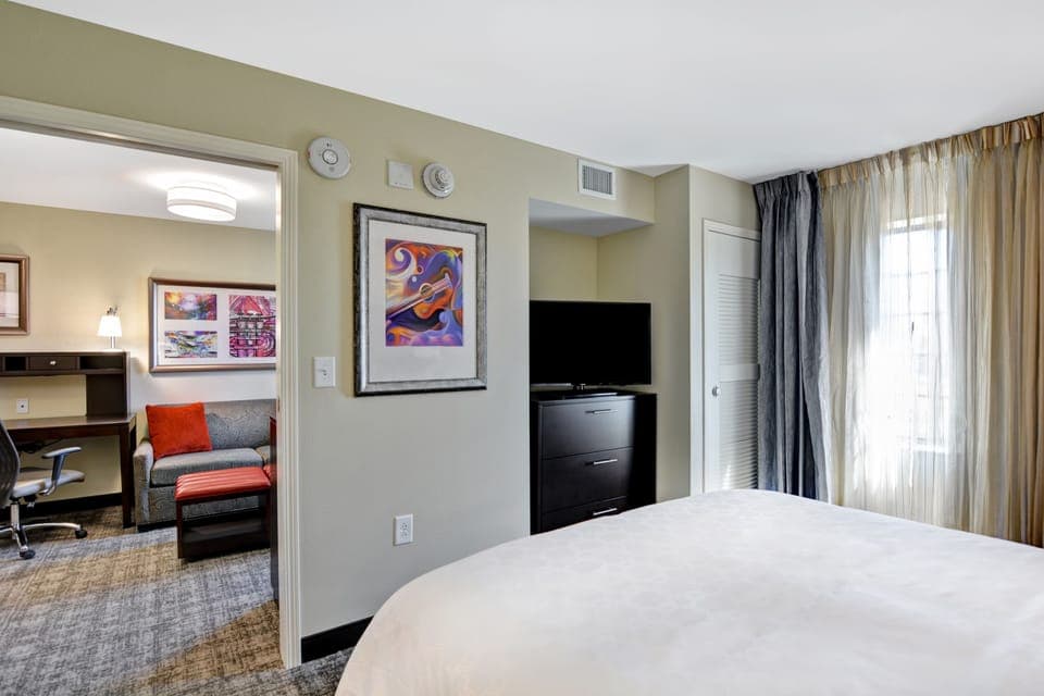 Premium bedding, down comforters, desk, blackout drapes