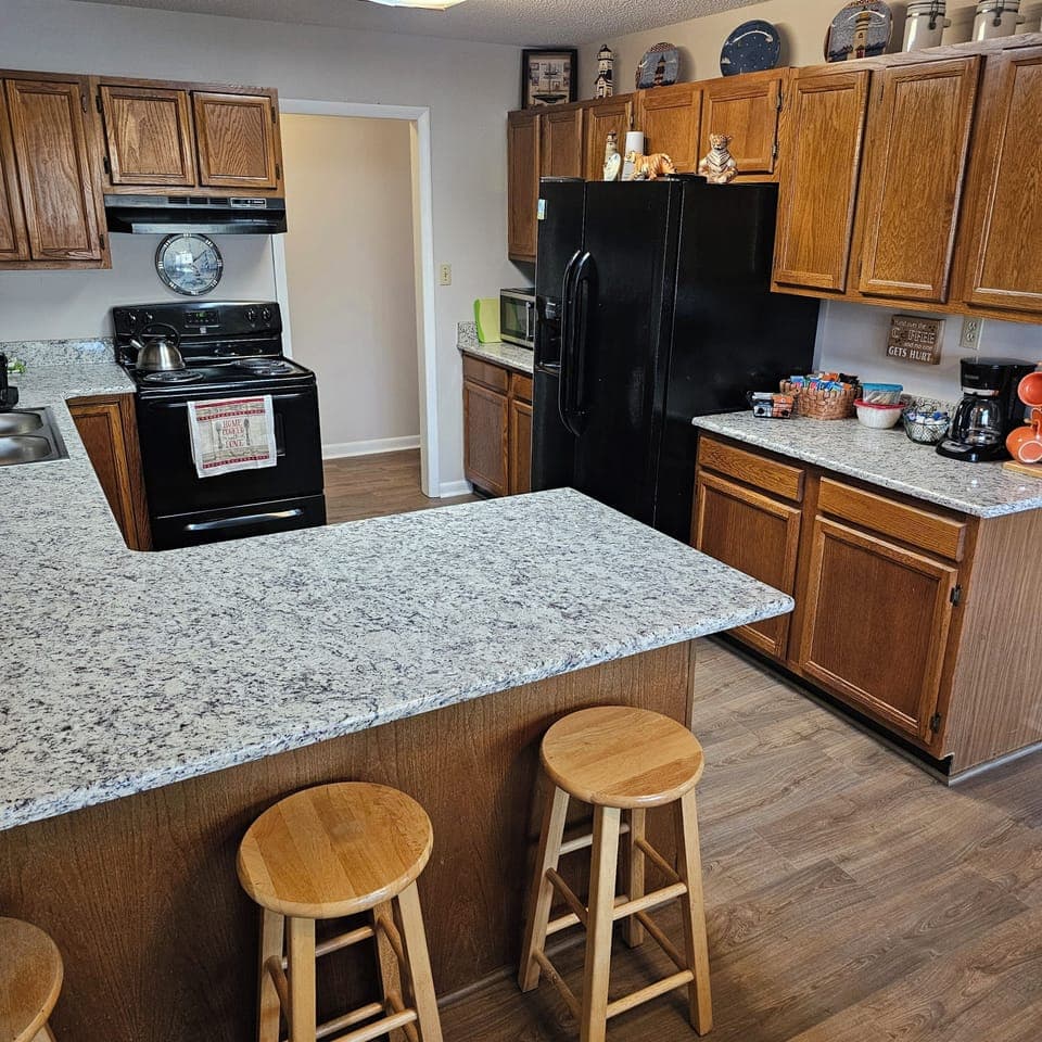 kitchen with bar seating for 3