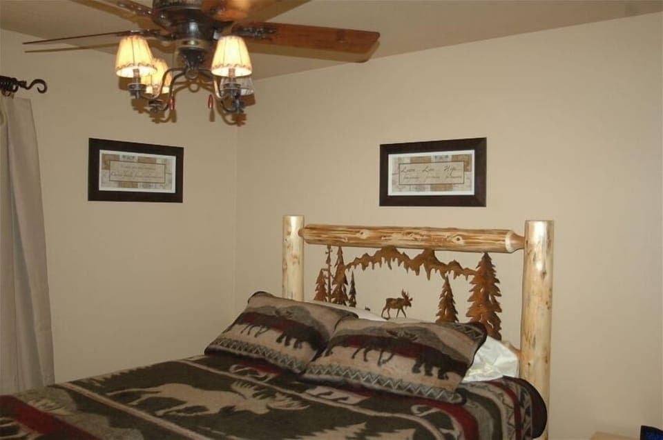 bedroom with moose lodge bedding