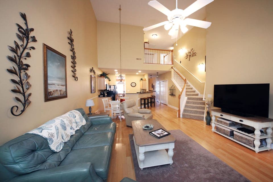 Spacious living area with  HD TV,  sound bar, and Amazon Firestick