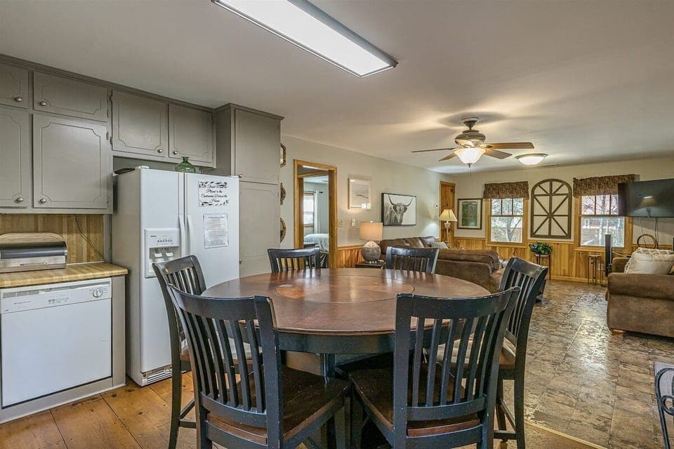 Dining area with view of living room & TV