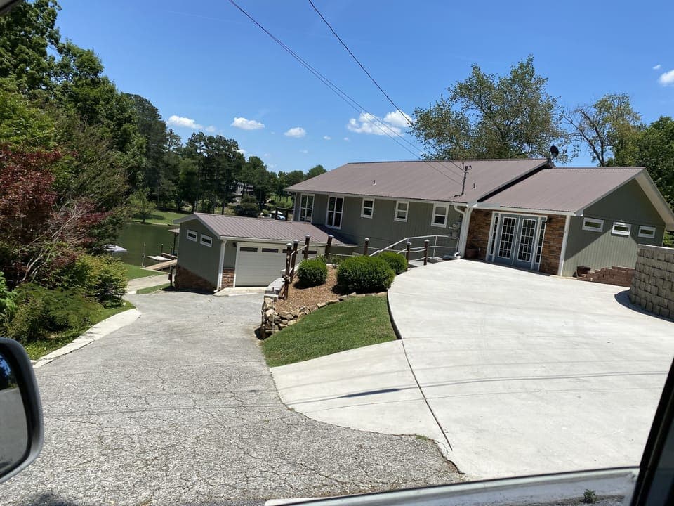 Plenty of parking on top or bottom driveway plus your own personal boat ramp 