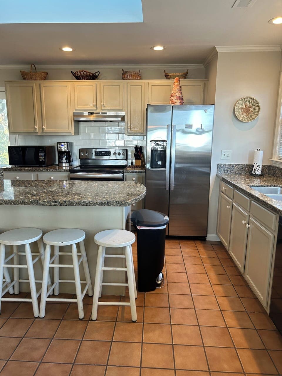 Spacious kitchen w/ solid surface countertops